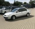 Сірий Міцубісі Lancer, об'ємом двигуна 1.58 л та пробігом 274 тис. км за 4400 $, фото 5 на Automoto.ua