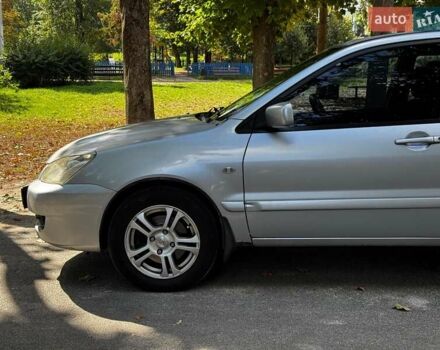 Серый Мицубиси Лансер, объемом двигателя 1.6 л и пробегом 196 тыс. км за 4490 $, фото 10 на Automoto.ua