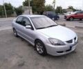 Сірий Міцубісі Lancer, об'ємом двигуна 2 л та пробігом 210 тис. км за 3999 $, фото 1 на Automoto.ua