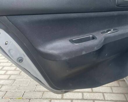 Сірий Міцубісі Lancer, об'ємом двигуна 1.58 л та пробігом 315 тис. км за 2350 $, фото 2 на Automoto.ua
