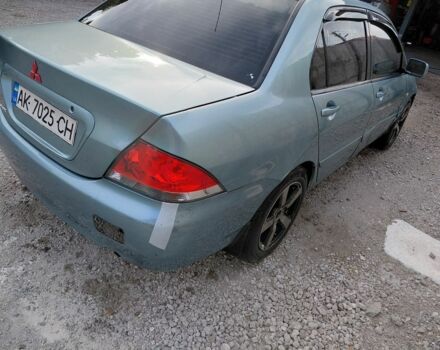 Мицубиси Лансер 2005 в Днепре (Днепропетровске) на Automoto.ua Серый Мицубиси Лансер, объемом двигателя 1.6 л и пробегом 200 тыс. км за 1400 $, фото 4 на Automoto.ua