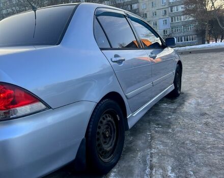 Сірий Міцубісі Lancer, об'ємом двигуна 1.6 л та пробігом 300 тис. км за 4200 $, фото 6 на Automoto.ua