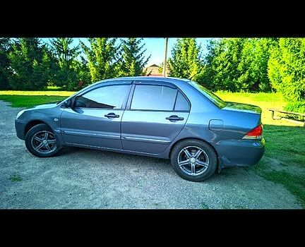 Сірий Міцубісі Lancer, об'ємом двигуна 1.6 л та пробігом 301 тис. км за 3700 $, фото 2 на Automoto.ua