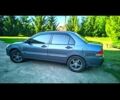 Сірий Міцубісі Lancer, об'ємом двигуна 1.6 л та пробігом 301 тис. км за 3700 $, фото 2 на Automoto.ua