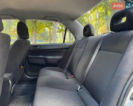 Серый Мицубиси Лансер, объемом двигателя 1.6 л и пробегом 196 тыс. км за 4490 $, фото 22 на Automoto.ua