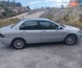 Сірий Міцубісі Lancer, об'ємом двигуна 1.6 л та пробігом 244 тис. км за 3300 $, фото 2 на Automoto.ua