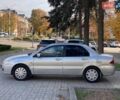 Серый Мицубиси Лансер, объемом двигателя 1.58 л и пробегом 200 тыс. км за 3850 $, фото 6 на Automoto.ua