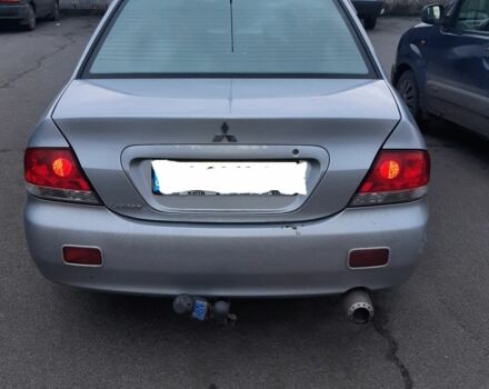 Сірий Міцубісі Lancer, об'ємом двигуна 1.6 л та пробігом 27 тис. км за 4200 $, фото 3 на Automoto.ua