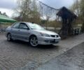 Серый Мицубиси Лансер, объемом двигателя 2 л и пробегом 355 тыс. км за 4400 $, фото 1 на Automoto.ua