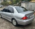 Мицубиси Лансер 2005 в Киеве на Automoto.ua Серый Мицубиси Лансер, объемом двигателя 1.6 л и пробегом 340 тыс. км за 2499 $, фото 2 на Automoto.ua