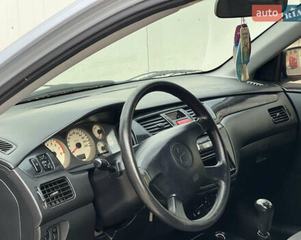 Сірий Міцубісі Lancer, об'ємом двигуна 1.6 л та пробігом 310 тис. км за 3350 $, фото 22 на Automoto.ua