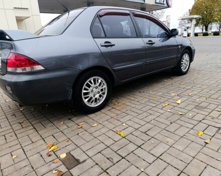 Серый Мицубиси Лансер, объемом двигателя 1.6 л и пробегом 100 тыс. км за 3500 $, фото 4 на Automoto.ua