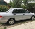 Сірий Міцубісі Lancer, об'ємом двигуна 1.58 л та пробігом 175 тис. км за 4150 $, фото 12 на Automoto.ua