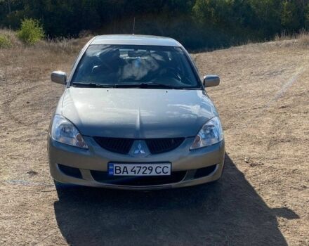 Сірий Міцубісі Lancer, об'ємом двигуна 1.6 л та пробігом 264 тис. км за 5000 $, фото 5 на Automoto.ua