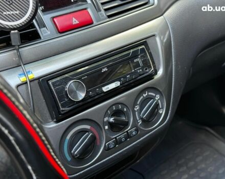 Мицубиси Лансер 2005 в Киеве на Automoto.ua Серый Мицубиси Лансер, объемом двигателя 1.6 л и пробегом 196 тыс. км за 4490 $, фото 19 на Automoto.ua