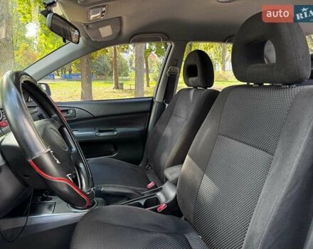 Серый Мицубиси Лансер, объемом двигателя 1.6 л и пробегом 196 тыс. км за 4490 $, фото 16 на Automoto.ua