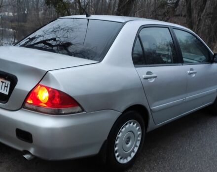 Серый Мицубиси Лансер, объемом двигателя 1.6 л и пробегом 235 тыс. км за 2850 $, фото 2 на Automoto.ua