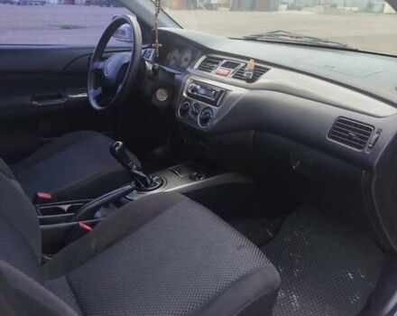 Сірий Міцубісі Lancer, об'ємом двигуна 1.6 л та пробігом 250 тис. км за 4000 $, фото 20 на Automoto.ua