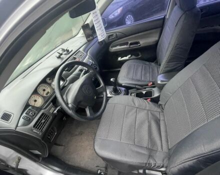 Серый Мицубиси Лансер, объемом двигателя 1.6 л и пробегом 200 тыс. км за 3906 $, фото 7 на Automoto.ua