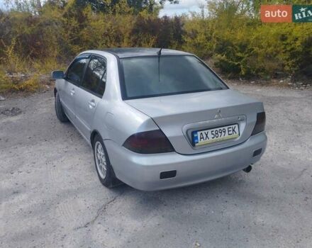 Сірий Міцубісі Lancer, об'ємом двигуна 1.6 л та пробігом 244 тис. км за 3300 $, фото 4 на Automoto.ua
