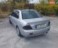 Сірий Міцубісі Lancer, об'ємом двигуна 1.6 л та пробігом 244 тис. км за 3300 $, фото 4 на Automoto.ua