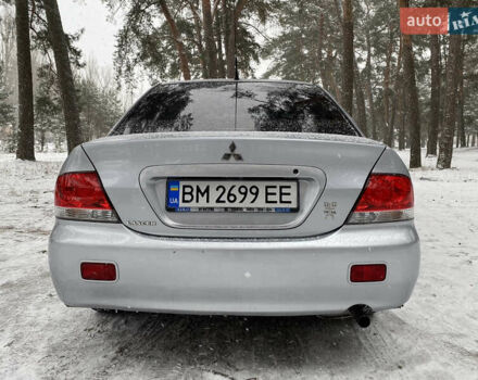 Серый Мицубиси Лансер, объемом двигателя 1.58 л и пробегом 225 тыс. км за 3950 $, фото 8 на Automoto.ua