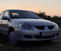 Серый Мицубиси Лансер, объемом двигателя 1.6 л и пробегом 155 тыс. км за 4000 $, фото 1 на Automoto.ua
