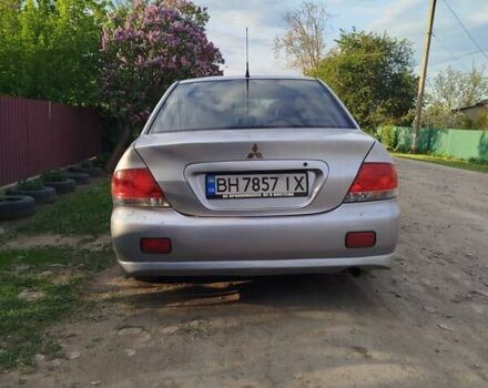 Серый Мицубиси Лансер, объемом двигателя 1.6 л и пробегом 199 тыс. км за 3300 $, фото 3 на Automoto.ua