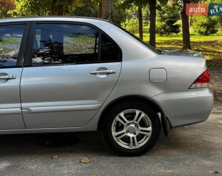 Серый Мицубиси Лансер, объемом двигателя 1.6 л и пробегом 196 тыс. км за 4490 $, фото 9 на Automoto.ua