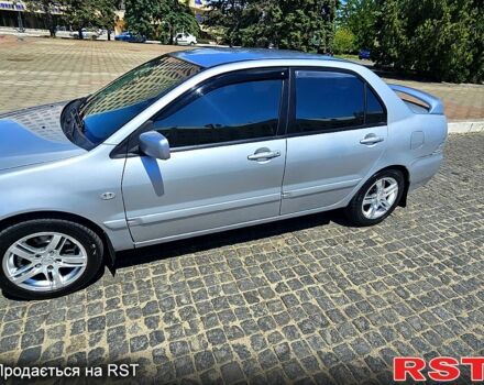 Сірий Міцубісі Lancer, об'ємом двигуна 2 л та пробігом 278 тис. км за 4000 $, фото 3 на Automoto.ua