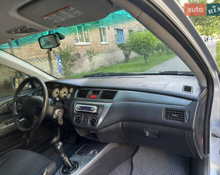 Сірий Міцубісі Lancer, об'ємом двигуна 1.58 л та пробігом 290 тис. км за 3500 $, фото 12 на Automoto.ua