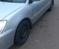 Сірий Міцубісі Lancer, об'ємом двигуна 1.6 л та пробігом 27 тис. км за 4200 $, фото 1 на Automoto.ua