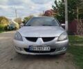 Серый Мицубиси Лансер, объемом двигателя 1.6 л и пробегом 199 тыс. км за 3300 $, фото 1 на Automoto.ua