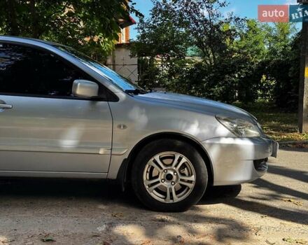 Серый Мицубиси Лансер, объемом двигателя 1.6 л и пробегом 196 тыс. км за 4490 $, фото 1 на Automoto.ua