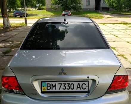 Серый Мицубиси Лансер, объемом двигателя 1.6 л и пробегом 189 тыс. км за 3950 $, фото 10 на Automoto.ua