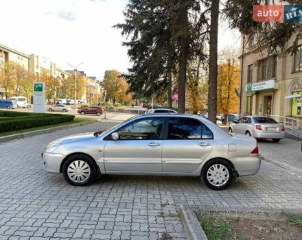 Серый Мицубиси Лансер, объемом двигателя 1.58 л и пробегом 250 тыс. км за 3750 $, фото 5 на Automoto.ua