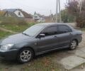 Сірий Міцубісі Lancer, об'ємом двигуна 0 л та пробігом 213 тис. км за 4205 $, фото 1 на Automoto.ua