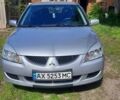 Сірий Міцубісі Lancer, об'ємом двигуна 1.58 л та пробігом 250 тис. км за 5000 $, фото 1 на Automoto.ua