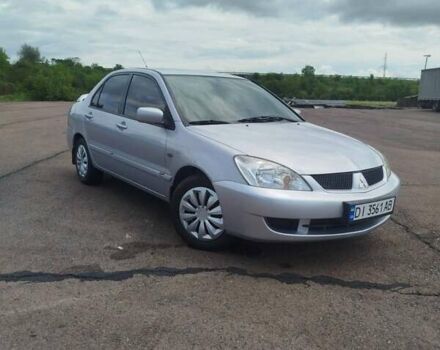 Сірий Міцубісі Lancer, об'ємом двигуна 1.6 л та пробігом 250 тис. км за 4000 $, фото 8 на Automoto.ua