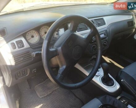 Сірий Міцубісі Lancer, об'ємом двигуна 1.6 л та пробігом 244 тис. км за 3300 $, фото 10 на Automoto.ua