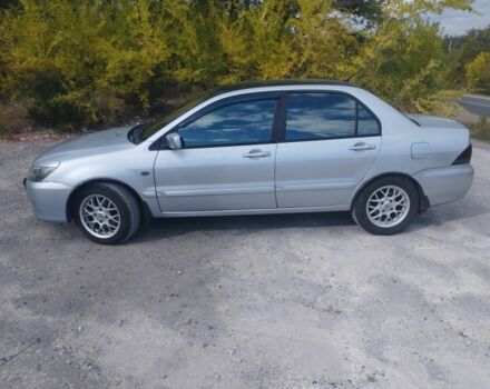 Сірий Міцубісі Lancer, об'ємом двигуна 1.6 л та пробігом 244 тис. км за 3300 $, фото 6 на Automoto.ua