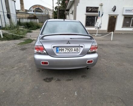 Серый Мицубиси Лансер, объемом двигателя 2 л и пробегом 212 тыс. км за 4300 $, фото 7 на Automoto.ua