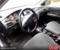 Сірий Міцубісі Lancer, об'ємом двигуна 1.6 л та пробігом 360 тис. км за 1999 $, фото 1 на Automoto.ua