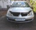 Сірий Міцубісі Lancer, об'ємом двигуна 1.58 л та пробігом 227 тис. км за 5400 $, фото 1 на Automoto.ua