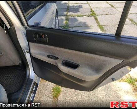 Серый Мицубиси Лансер, объемом двигателя 1.6 л и пробегом 189 тыс. км за 3950 $, фото 8 на Automoto.ua