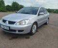 Сірий Міцубісі Lancer, об'ємом двигуна 1.6 л та пробігом 250 тис. км за 4000 $, фото 15 на Automoto.ua