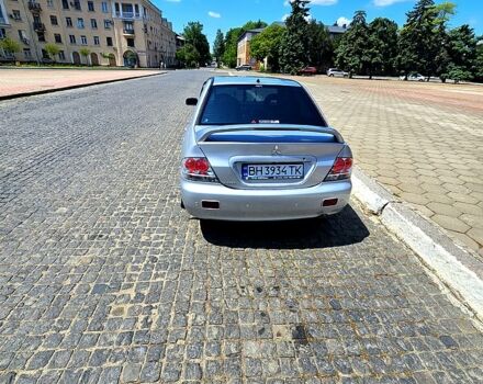 Сірий Міцубісі Lancer, об'ємом двигуна 2 л та пробігом 278 тис. км за 4000 $, фото 6 на Automoto.ua