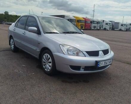 Сірий Міцубісі Lancer, об'ємом двигуна 1.6 л та пробігом 250 тис. км за 4000 $, фото 11 на Automoto.ua