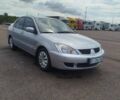 Сірий Міцубісі Lancer, об'ємом двигуна 1.6 л та пробігом 250 тис. км за 4000 $, фото 11 на Automoto.ua