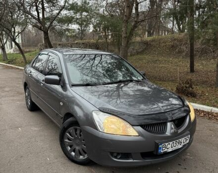 Сірий Міцубісі Lancer, об'ємом двигуна 1.6 л та пробігом 230 тис. км за 2799 $, фото 8 на Automoto.ua